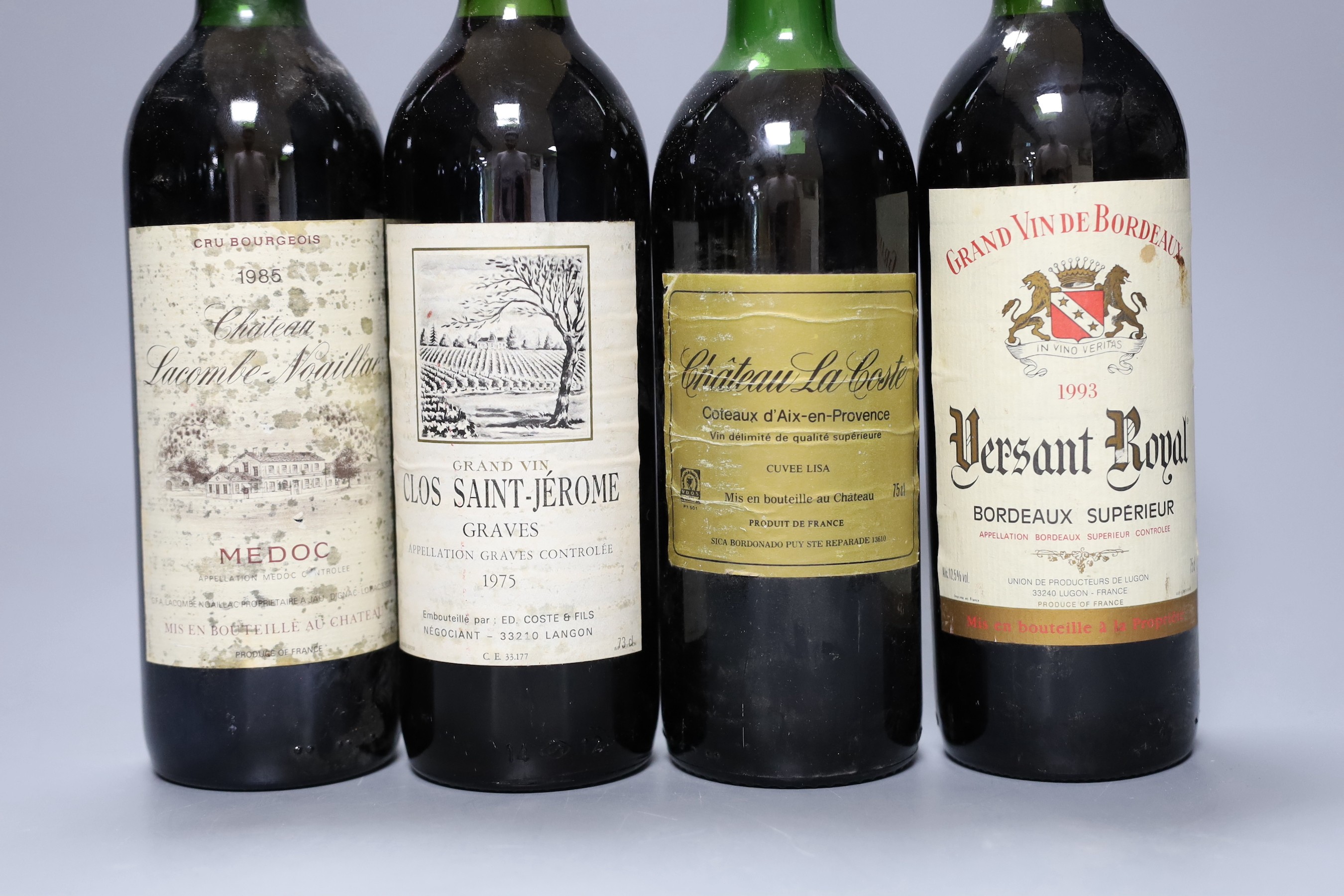 Ten bottles of various wine to include 1975 Clos Saint-Jerome, 1982 Baron Philippe Mouton Cadet, 1985 Chateau Lacombe-Noaillac and others